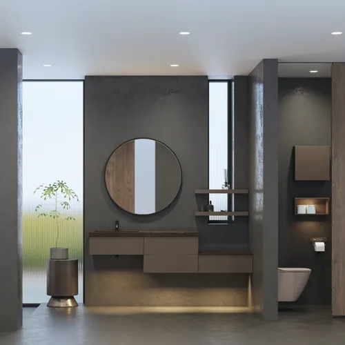 Stilrent och rymligt badrumsinspiration med stor rund spegel med svart ram, mörk stenhandsfat, färgad toalett, överskåp och öppen hylla i en sofistikerad och dämpad design