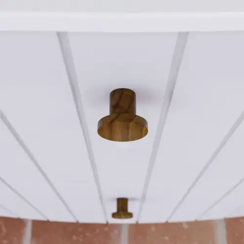 Stor badrumsinspiration med vita möbler med räfflor, eleganta bänkskivor och fristående handfat, ovala speglar med ljus, synliga bjälkar och mönstrade kakel skapar ett vintage och stilfullt uttryck