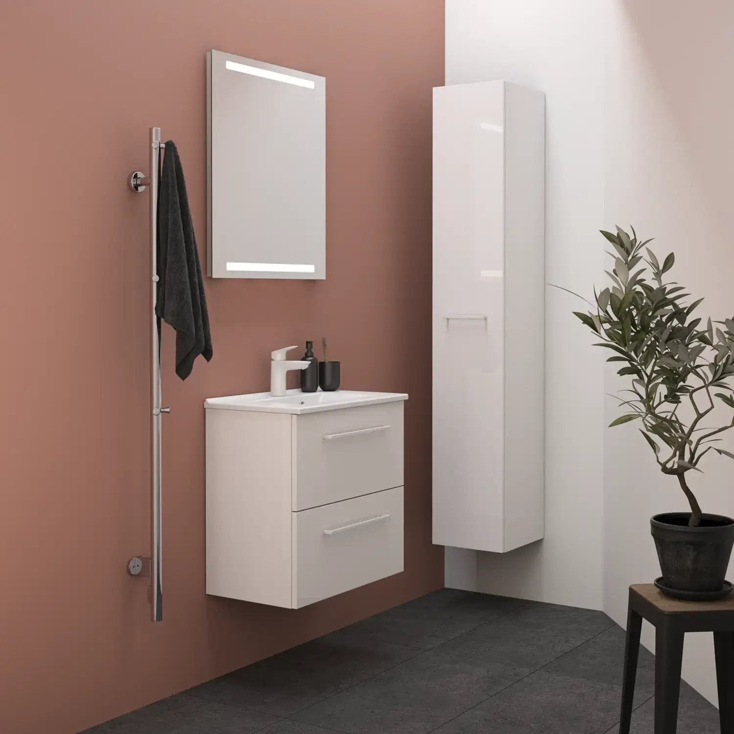 Liten badrumsinspiration med vita badrumsmöbler med vita handtag, elegant tvättställ och vacker spegel med integrerad belysning, stora grå kakelplattor och rosa vägg för en modern look.