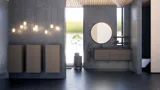 Modernt badrum med grå väggar, trätak och rund spegel. Minimalistisk design med snygga förvaringsskåp.