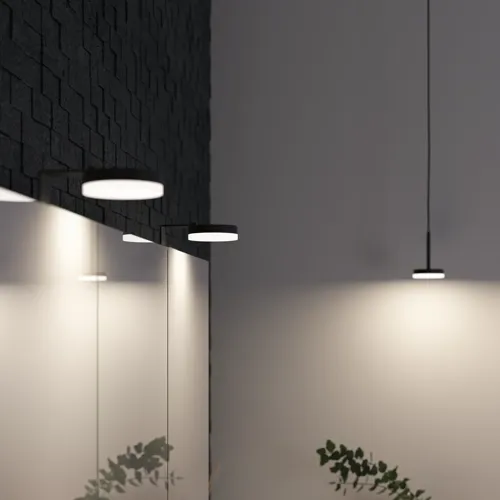 Badrumsinspiration med moderna svarta lampor, som framhäver badrummets minimalistiska och eleganta stil med dämpad belysning.
