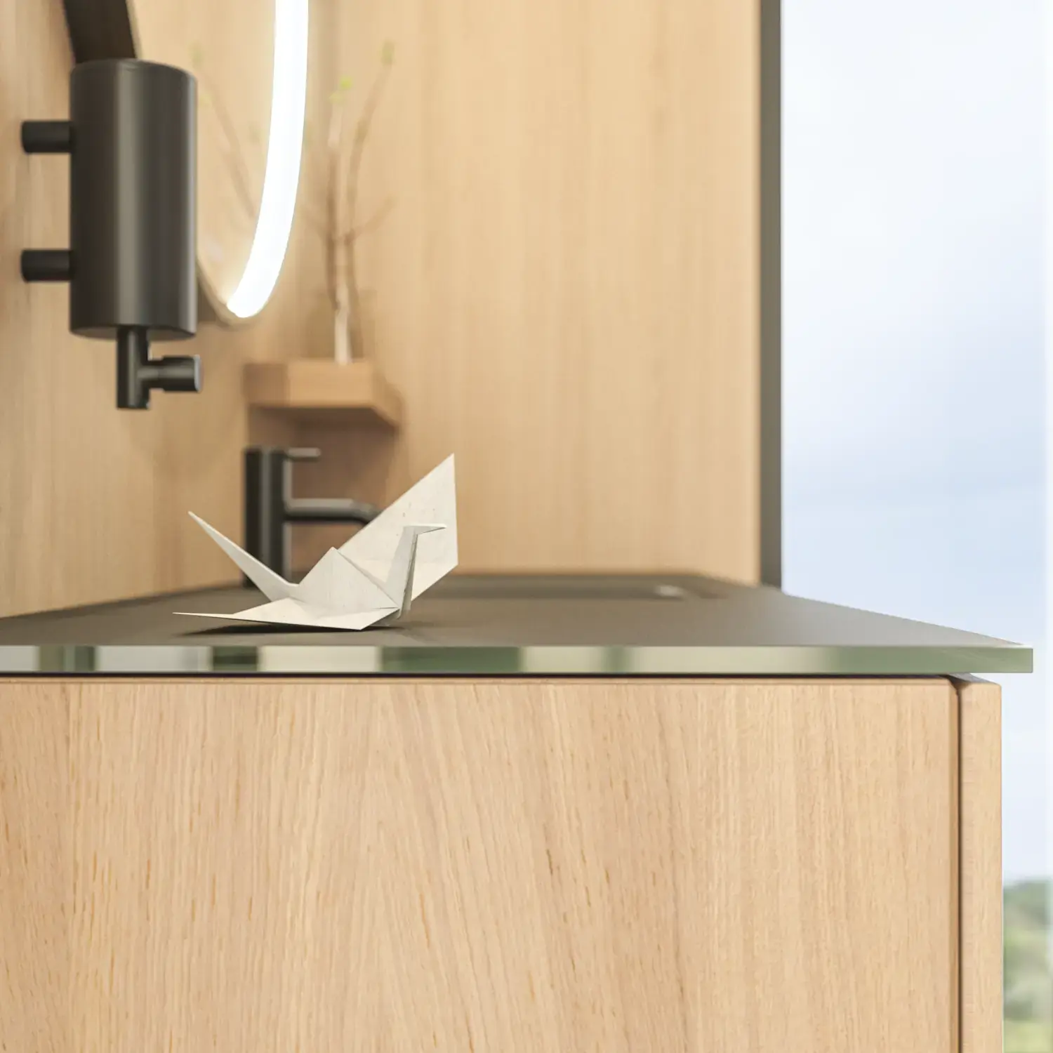 Stilrent badrum i skandinavisk och japandi inredningsstil med ljusa träväggar, rund spegel och minimalistiska badrumsmöbler.