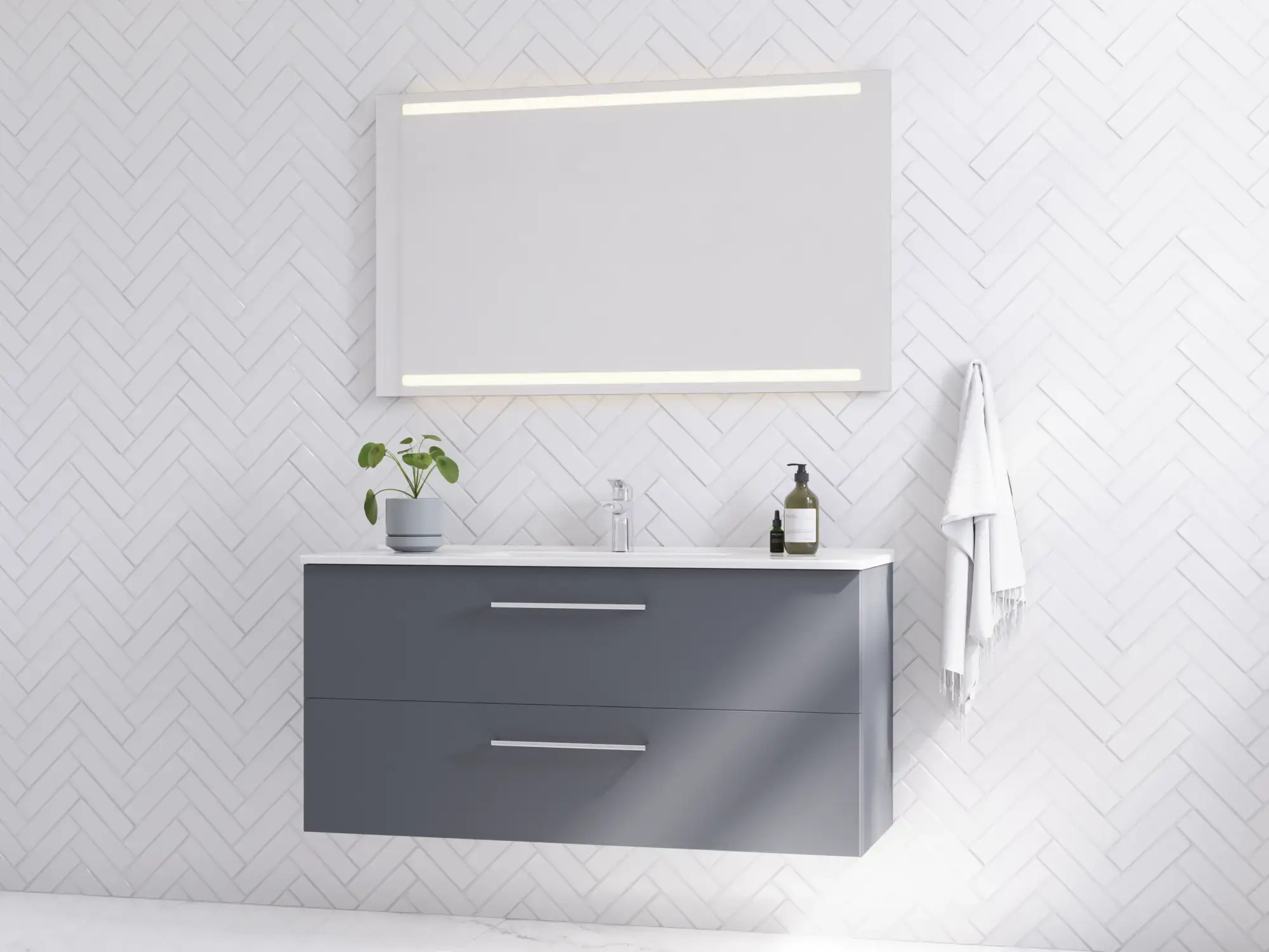 Stor badrumsinspiration med brett tvättställsskåp i grå matt med elegant handfat och stor fyrkantig spegel med integrerat ljus. Stora vita plattor på golvet och vita fiskbensplattor på väggen ger ett ljust och modernt utseende.
