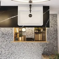 Stor urban badrumsinspiration med möbler i naturlig ek, stenbänkskiva med fyrkantig vask, runt spegel med svart kant, naturfärger och terrakottagolv ger en industriell och modern känsla