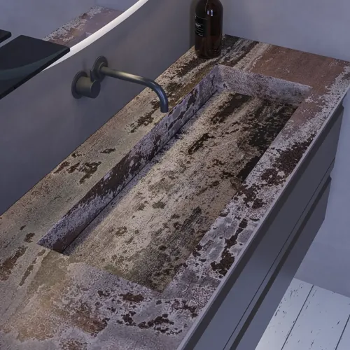 Stor badrumsinspiration med grå underskåp med integrerat handtag, snyggt sidomonterat handfat, fyrkantig spegel med rundade hörn, väggar i betonglook och råa material för en urban look